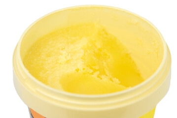 The natural clarified butter in the bucket