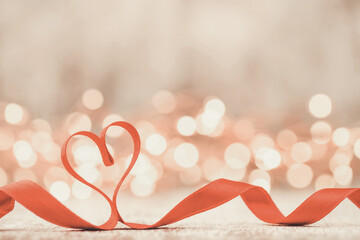 Red heart with ribbon. Valentines day background.