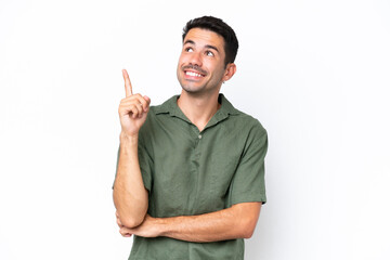 Young handsome man over isolated white background pointing up a great idea