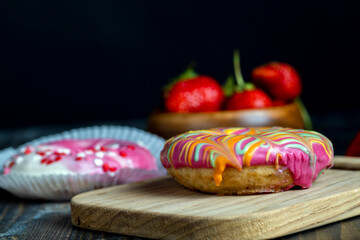 round donuts in glaze and with berry filling