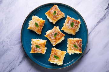Miguelitos de la Rueda. Traditional Spanish dessert made with puff pastry and cream filling.