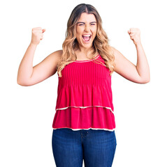 Young caucasian woman wearing casual clothes screaming proud, celebrating victory and success very...