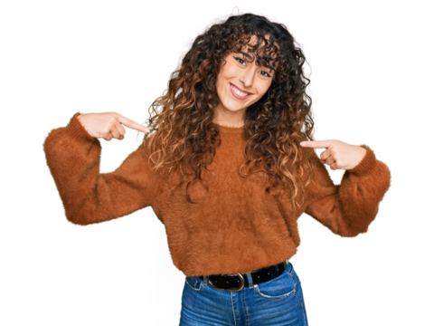 Young hispanic girl wearing casual clothes looking confident with smile on face, pointing oneself with fingers proud and happy.