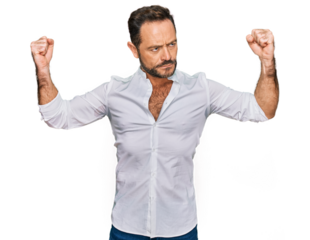 Middle age man wearing casual clothes showing arms muscles smiling proud. fitness concept.