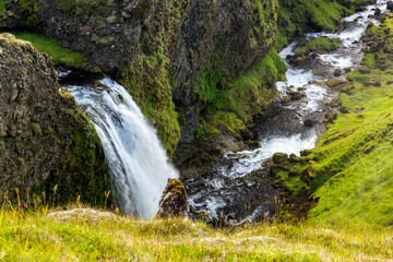 an unknown little waterfall next to the famous Seljalandsfoss waterfall, Iceland