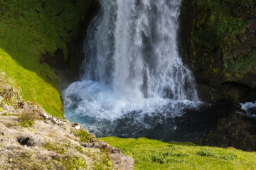 an unknown little waterfall next to the famous Seljalandsfoss waterfall, Iceland