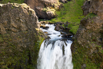 an unknown little waterfall next to the famous Seljalandsfoss waterfall, Iceland