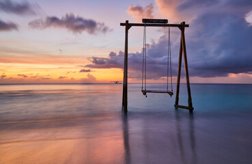 Sea swing at dawn - Powered by Adobe