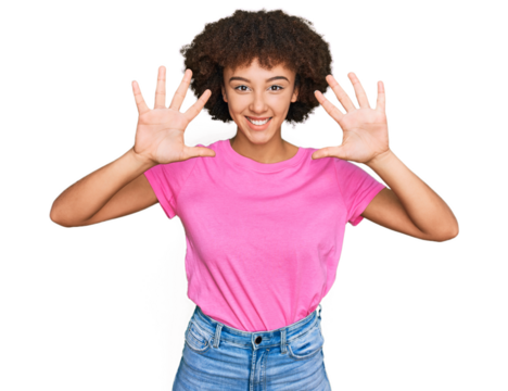 Young hispanic girl wearing casual clothes showing and pointing up with fingers number ten while smiling confident and happy.