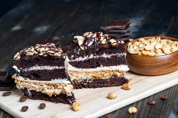 chocolate cake with nut filling and peanuts