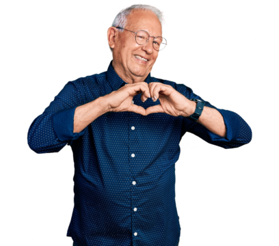 Senior man with grey hair wearing casual shirt and glasses smiling in love doing heart symbol shape with hands. romantic concept.