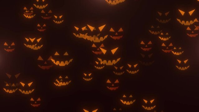 Halloween glowing pumpkins. Halloween animated background of animated scary pumpkins and particles