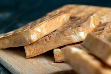 square sweet soft waffles on the table