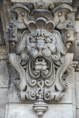 Fototapeta na wymiar Ancient decoration element of scary lion head in downtown historical center of Dresden, Germany