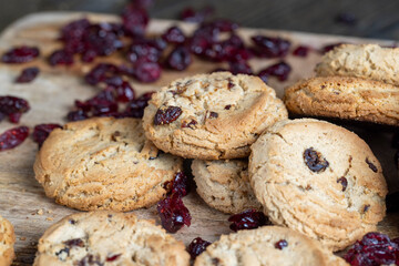 delicious dried cookies made of high-quality flour with dried red cranberries on the table