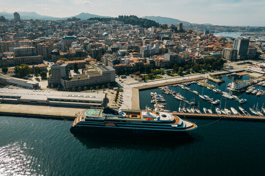 Aerial drone view of cruise ship, marina and view of centre of Vigo, Galicia, Spain