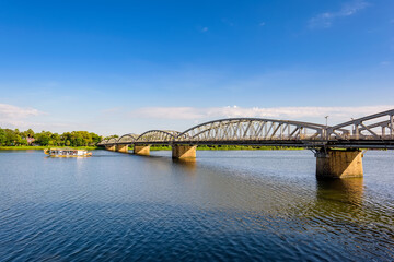 Trang Tien Bridge (also known as Truong Tien Bridge) was the first bridge in Indochina built to cross Huong Giang in Hue city of Vietnam. The bridge was built by the French in the late 19th century