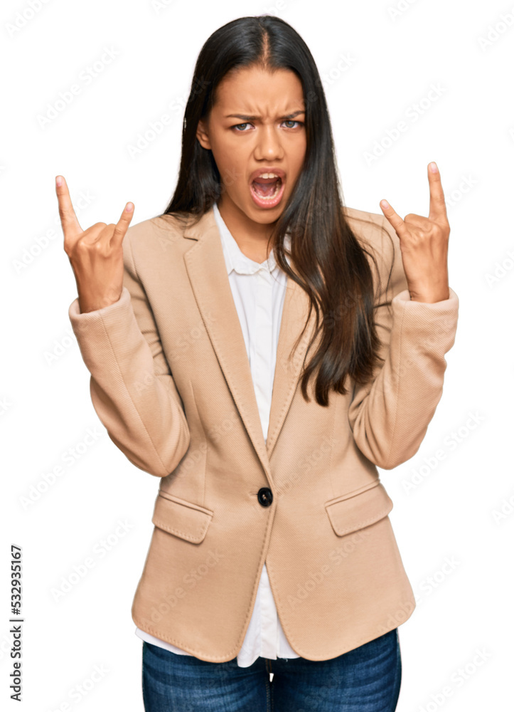 Sticker beautiful hispanic woman wearing business jacket shouting with crazy expression doing rock symbol wi