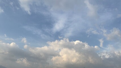 Fototapeta na wymiar Cute clouds background