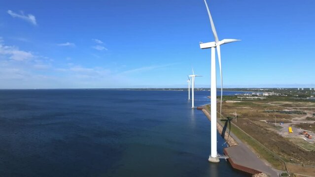 EGS power plant and Windmills aerial view. Renewable energy. Green tech.