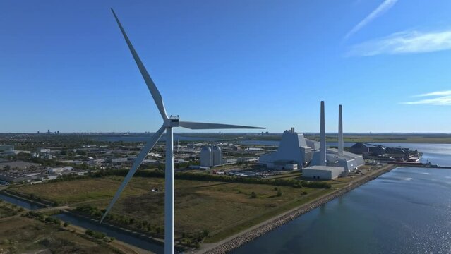 EGS power plant and Windmills aerial view. Renewable energy. Green tech.