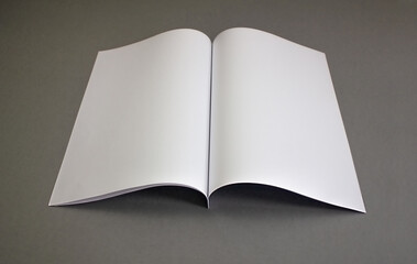 Open book, magazine or catalog on a black background. A4 format template.