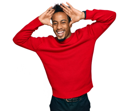 Young african american man with beard wearing casual winter sweater smiling cheerful playing peek a boo with hands showing face. surprised and exited - Powered by Adobe