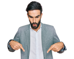 Young hispanic man wearing business clothes pointing down with fingers showing advertisement, surprised face and open mouth