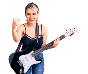 Young beautiful blonde woman playing electric guitar annoyed and frustrated shouting with anger, yelling crazy with anger and hand raised