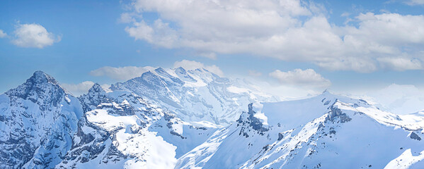 Fototapeta na wymiar Panoramic of Swiss Mountain against the blue sky background