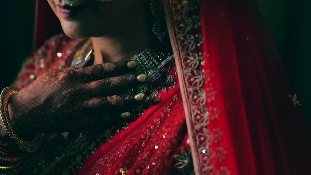 New Delhi, India-September 2022: A Shot of an Indian Bride showing her Bridal Jewellery at her Indian Wedding in India