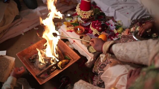 A shot of rituals being performed at an Indian Wedding in India
