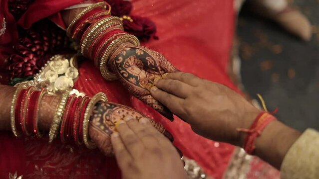 A shot of rituals being performed at an Indian Wedding in India