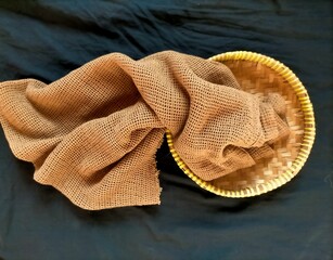 Clothing in the basket on black background 