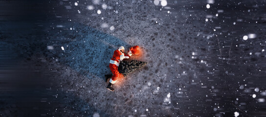 Santa Claus on ice skates goes to Christmas. Santa Claus hurries to meet the New Year with gifts and Christmas tree.