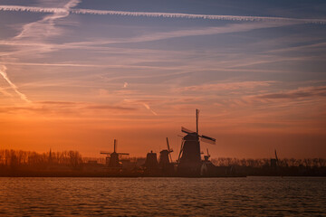 dutch windmill at sunset