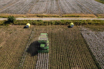 Drone footage . Cotton collecting vehicle . Cotton harvesting in Turkey - Izmir - Menemen plain