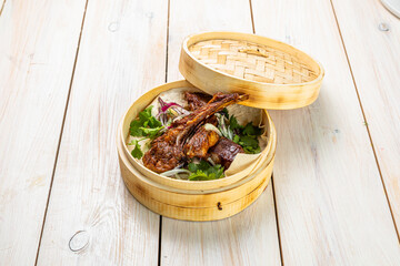 grilled lamb ribs with fresh vegetables and lavash