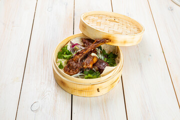 grilled lamb ribs with fresh vegetables and lavash