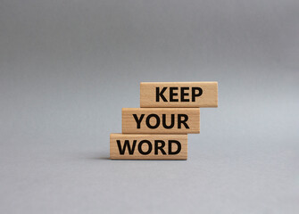 Keep your word symbol. Wooden blocks with words Keep your word. Beautiful grey background. Business and Keep your word concept. Copy space.