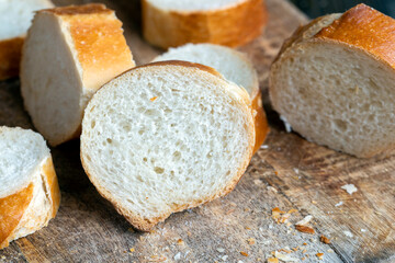 a wheat baguette cut into pieces, close up