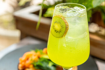 fresh lemonades from different fruits in a glass