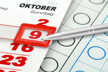 Deutscher Kalender und Landtagswahl am 9. Oktober 2022 in Niedersachsen mit Stimmzettel