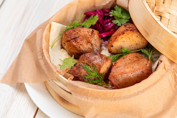 barbecue with marinated red onion and fresh herbs