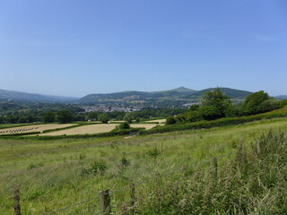 Fototapeta na wymiar View of Abergavenny and Sugar Loaf Mountain as seen from Little Skirrid (Ysgyryd Fach)