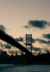 Fototapeta na wymiar Sunset on the bosphorus bridge in istanbul with clouds