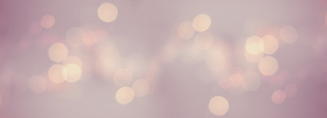 Bokeh background for christmas, defocused round lights in pastel color, flare overlay
