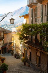 Bellagio , Coastal town at Lake Como , Lombardy . Salita Serbelloni street during autumn , winter sunny day : Lake Como , Italy : December 7 , 2019