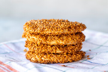 Sesame cookies. Salty cookies on gray background. close up