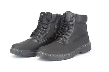 Pair of new winter boots close up on white background